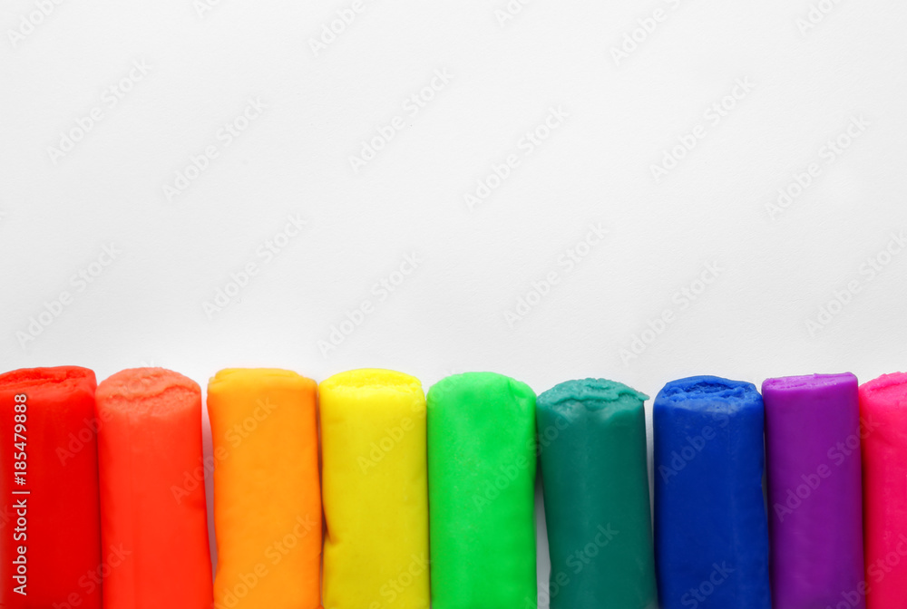 Rainbow play dough on white background Rainbow play dough on white background