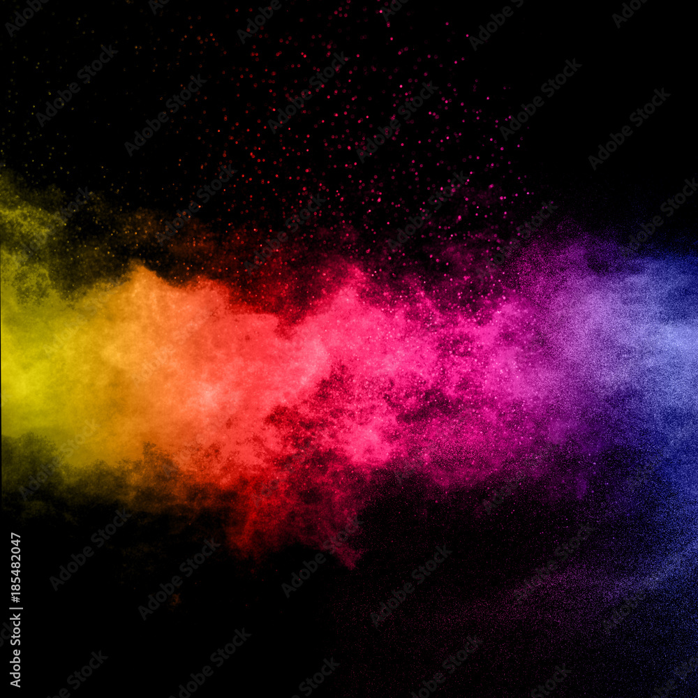 abstract color powder explosion on black background.abstract Freeze motion of color powder splash.