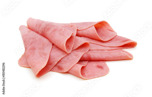 Fotografie Sliced honey ham on white
