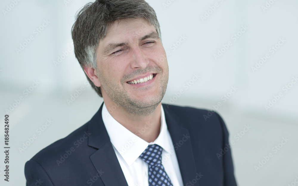 Portrait of a smiling successful businessman. Portrait of a smiling successful businessman.