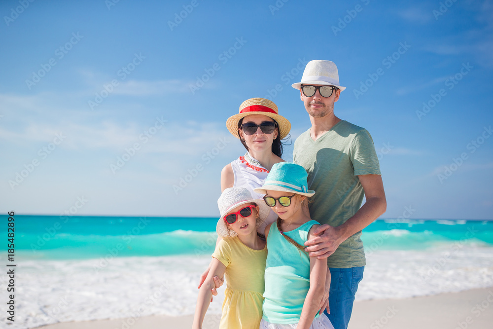 Parents and kids on beach vacation. Closeup of family