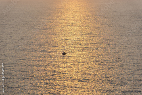 Fishing boat at sunset.