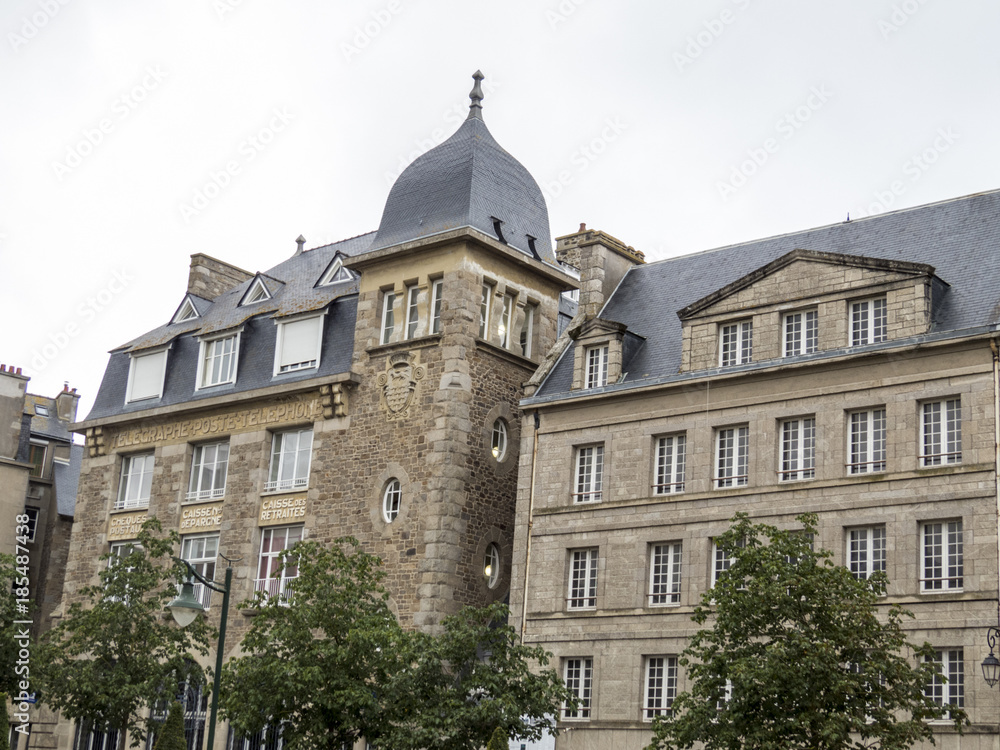 Saint Malo, Normandy, France. Architectural building with typical roofs and chimney. Saint Malo, Normandy, France. Architectural building with typical roofs and chimney.