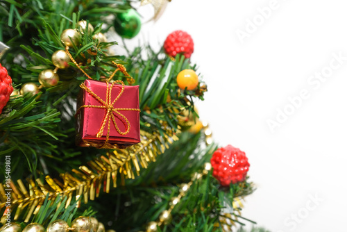 christmas tree and red box gift on white background, happy new year concept