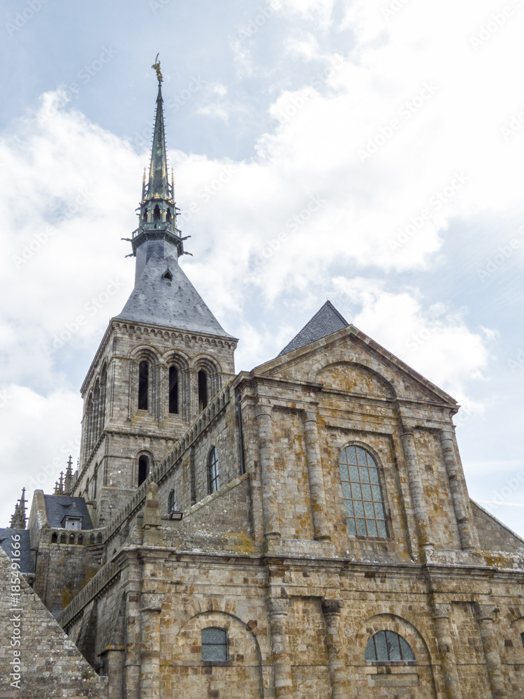 Obraz premium Mont St. Michel, Normandy, France. Le Mont Saint-Michel is an island, the seat of the monastery from which it draws its name.