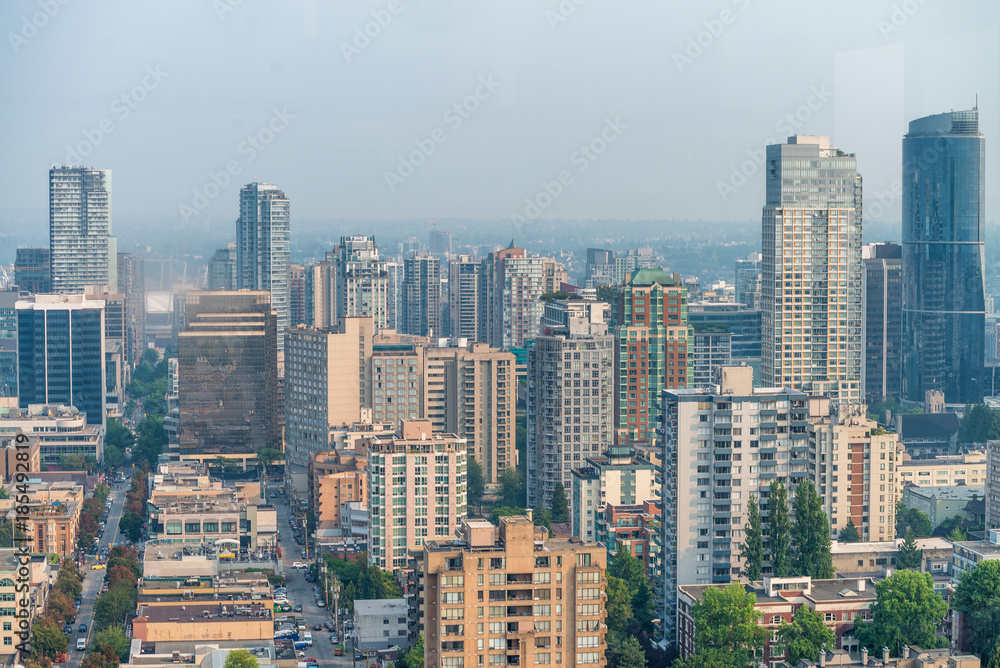 Aerial view of Vancouver Downtown skyline from city rooftop, British Columbia, Canada
