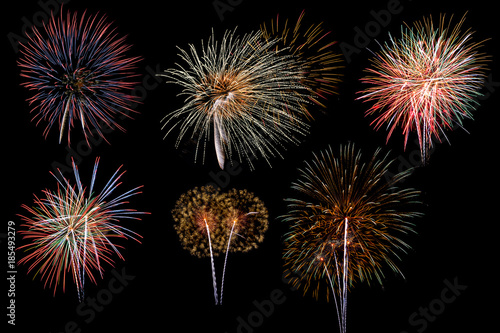Colorful firework on the night sky. New Year celebration fireworks. Abstract firework isolated on black background with free space for text