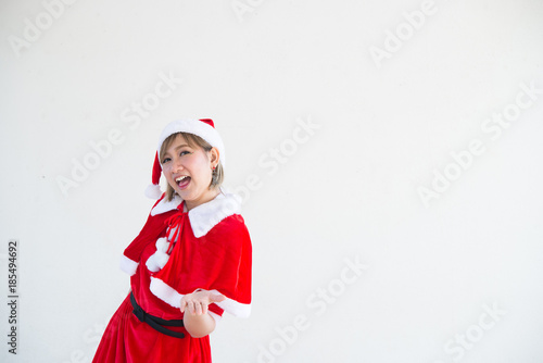 Beautiful young asian woman in Santa Claus clothes on white background,Thailand people,Sent happiness for children,Merry christmas,Welcome to winter,Happy woman concept