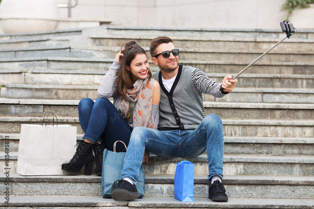 Couple making a pause break and taking a selfies