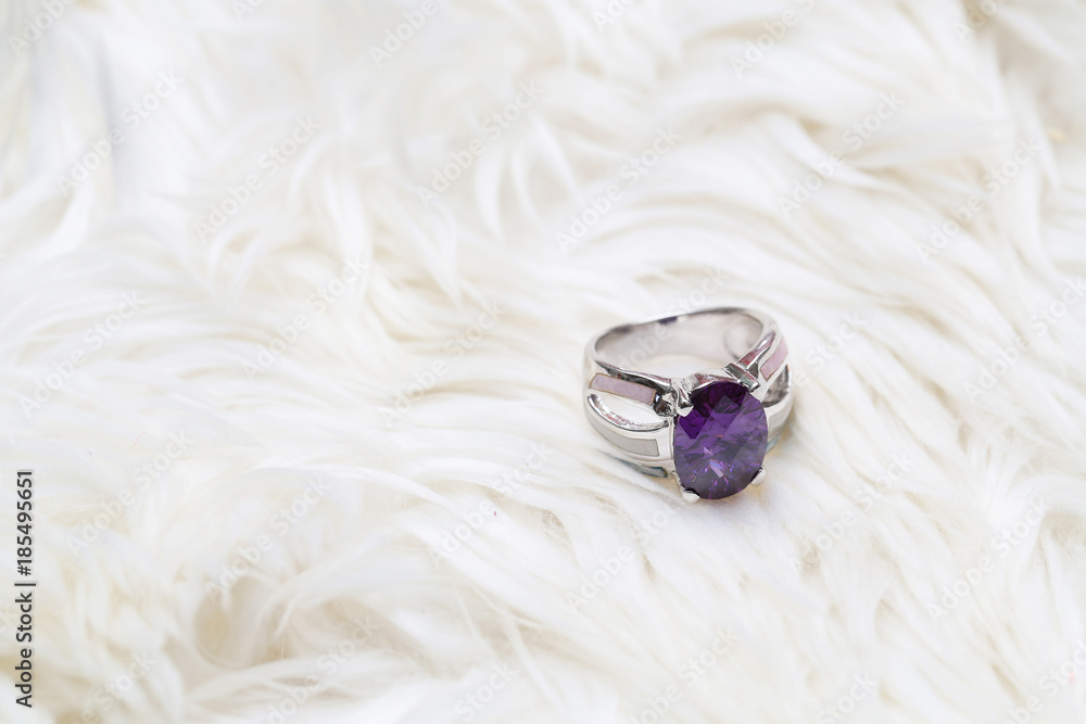 Obraz premium purple gemstone on silver ring