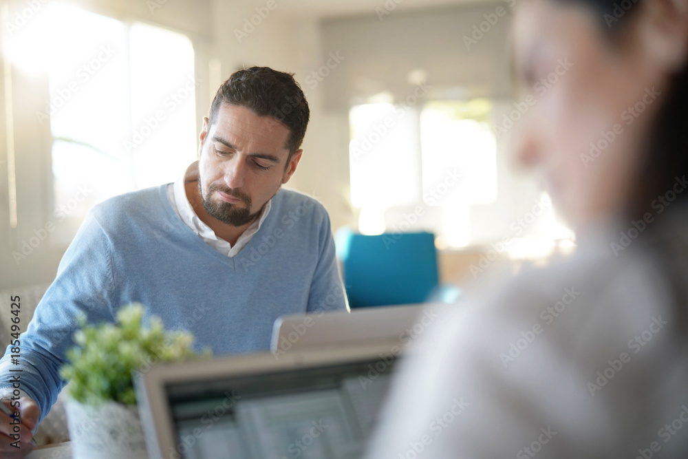 Fototapeta premium Startup people working in office on laptop computer