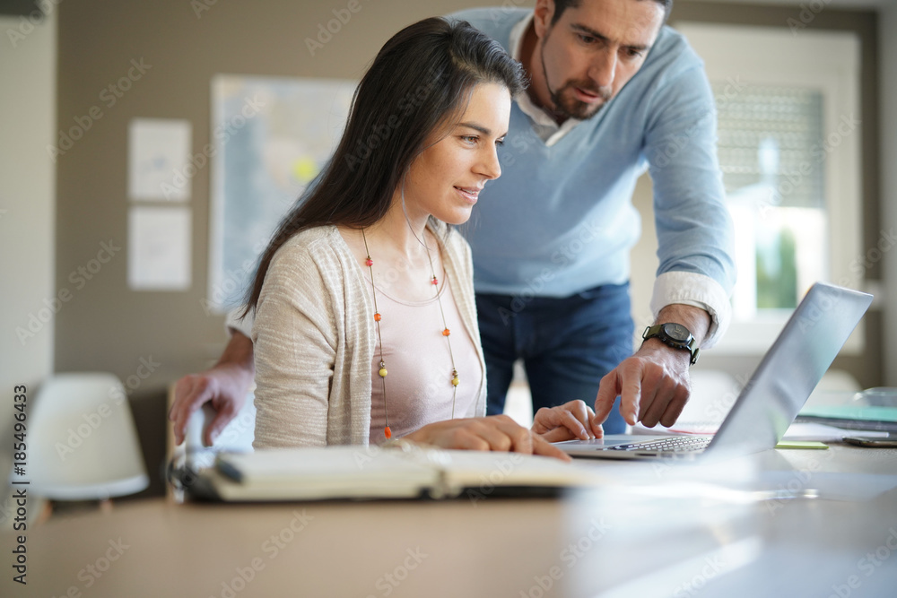 Business people working together in office Business people working together in office