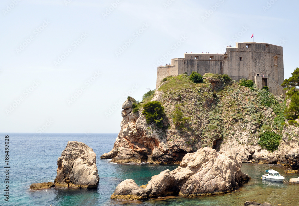 the centre of Dubrovnik, historic buildings, FORTS, roads paved with stone. The castle is located on the coast or in the Bay in a beautiful picturesque lagoon.