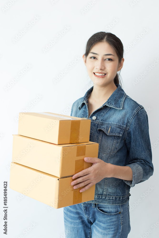 Young Asian Woman holding box with attractive smiling. isolated on white background. Young Asian Woman holding box with attractive smiling. isolated on white background.
