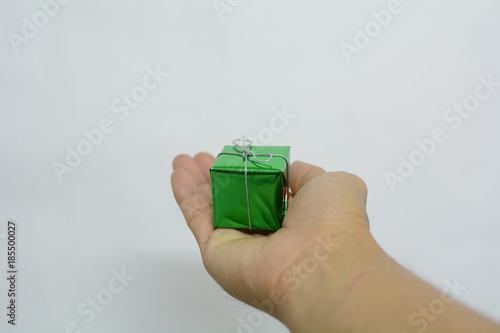 Gift box on hand to celebrate Christmas and New Year 2018 on white background  photo