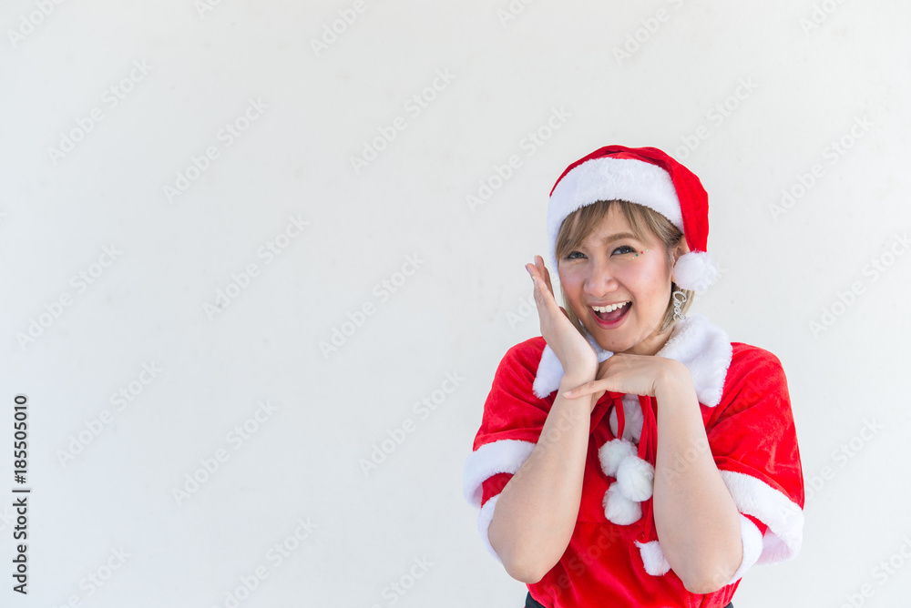 Beautiful young asian woman in Santa Claus clothes on white background,Thailand people,Sent happiness for children,Merry christmas,Welcome to winter,Happy woman concept Beautiful young asian woman in Santa Claus clothes on white background,Thailand people,Sent happiness for children,Merry christmas,Welcome to winter,Happy woman concept