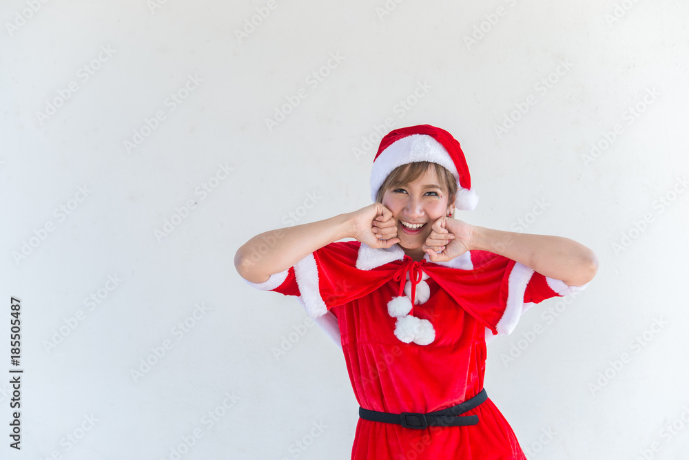 Beautiful young asian woman in Santa Claus clothes on white background,Thailand people,Sent happiness for children,Merry christmas,Welcome to winter,Happy woman concept Beautiful young asian woman in Santa Claus clothes on white background,Thailand people,Sent happiness for children,Merry christmas,Welcome to winter,Happy woman concept