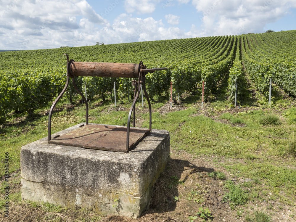 Ay, Champagne, France. water well in the Hills covered with vineyards in the wine region of Champagne, France. Moet & Chandon Ay, Champagne, France. water well in the Hills covered with vineyards in the wine region of Champagne, France. Moet & Chandon