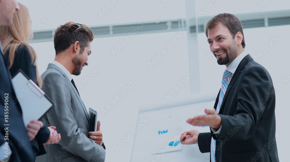 Business and office concept - smiling business team working in Business and office concept - smiling business team working in