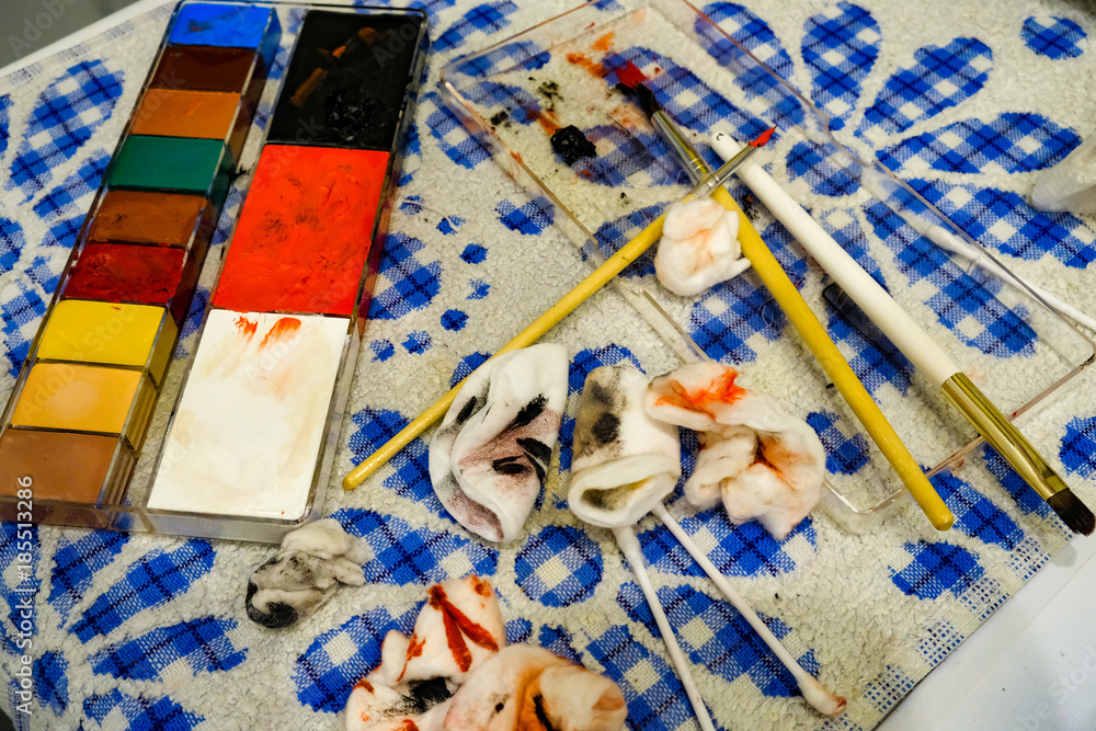 paint and make-up brushes on the table paint and make-up brushes on the table