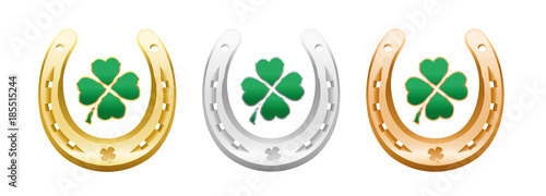 Four leaf clovers in golden, silver and bronze horseshoes - lucky symbols representing success, health, wealth, fortune, luck, happiness and prosperity - isolated vector on white background.