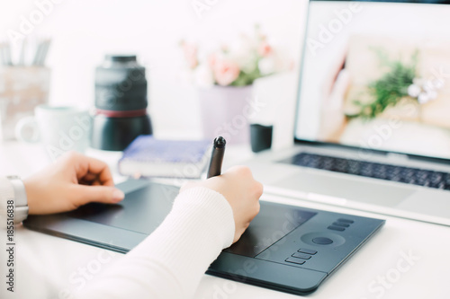 retouching on computer laptop