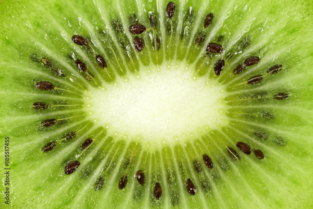 Kiwi fruit slice, for backgrounds or textures Kiwi fruit slice, for backgrounds or textures