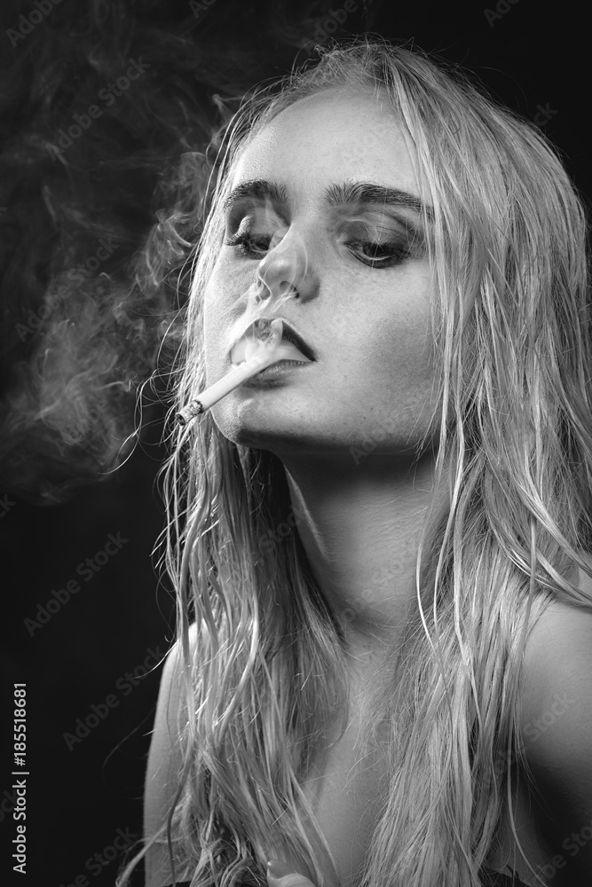 blond woman smoking