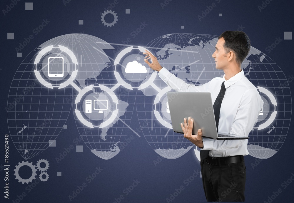 Businessman holding laptop Businessman holding laptop