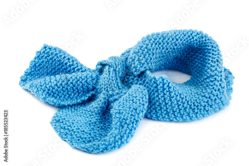 Blue knitted scarf isolated on white background