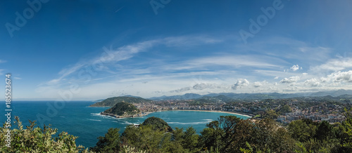 Panoramic vista of a city in a beautiful bay with islands and gr