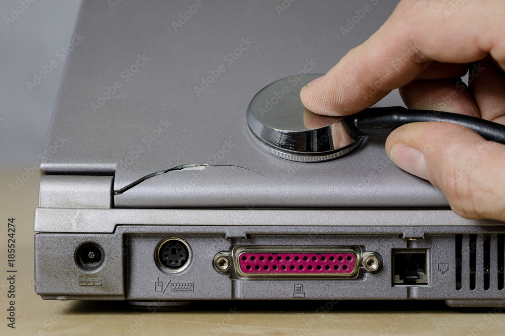 Obraz premium Computer treatment on a computer service. Repair and diagnostics of computer hardware. Computer equipment on a workshop table.