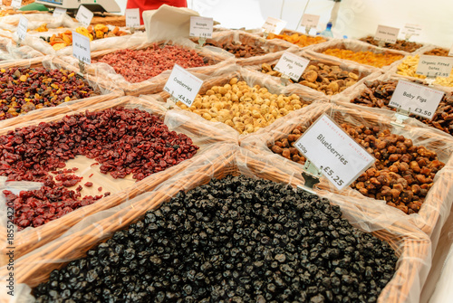 Dried fruit for sale at a market stall © Stephen