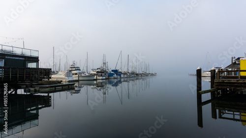 Boating dock on a calm misty morning 01