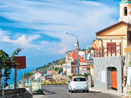 Car on road in Agerola on Amalfi coast photo