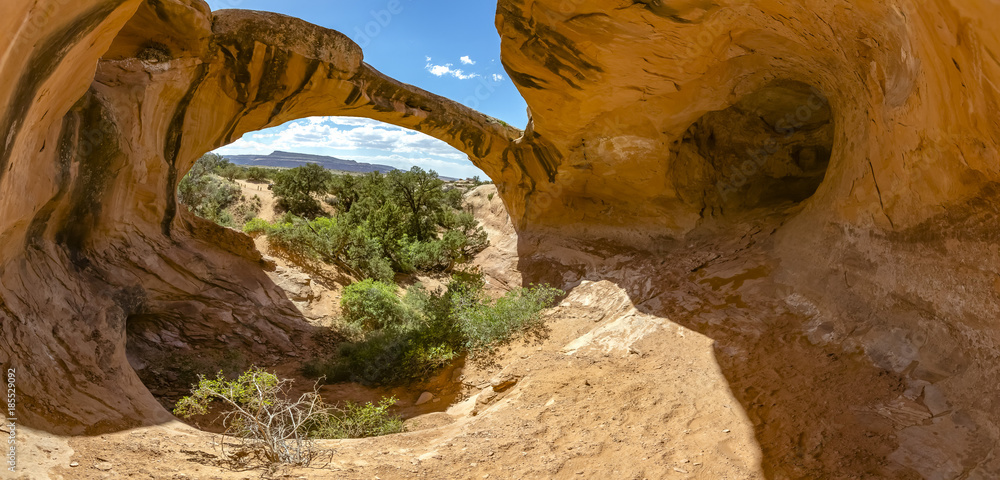 Uranium Arch in Moab, Utah. Panorama of both inside and outside the caverns area