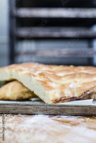 cheese and focaccia pizza bread in the bakery photo