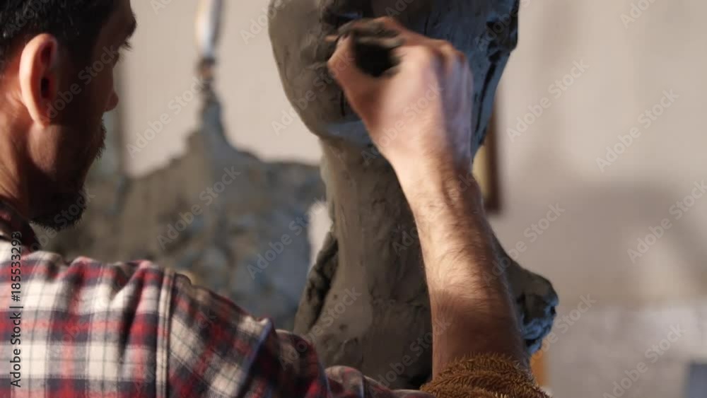 sculptor working female bust from pottery clay sculptor working female bust from pottery clay