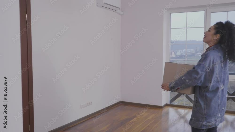 Beautiful brunette relocates in a new house Beautiful brunette relocates in a new house