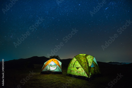camping in moutain at night with star.