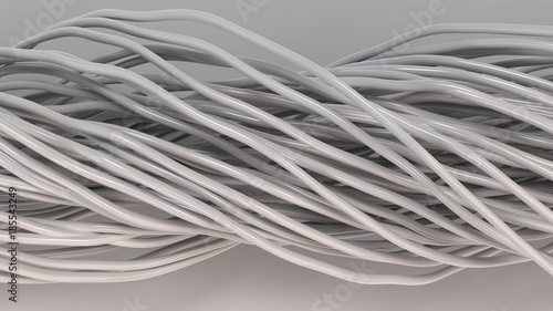 Twisted white cables and wires on white surface
