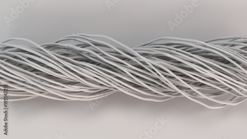 Twisted white cables and wires on white surface