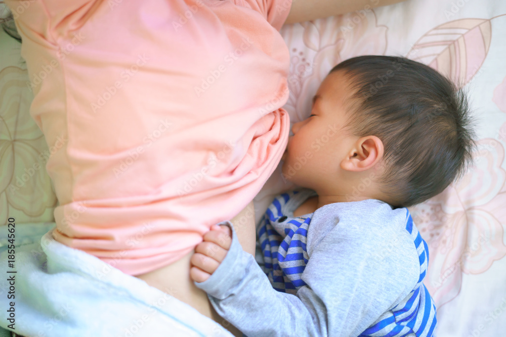 Asian boy about 1 year and 11 months old Asian baby breastfeeding Asian boy about 1 year and 11 months old Asian baby breastfeeding