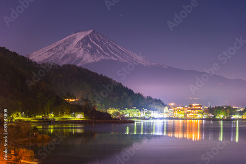 Beautiful view of Fuji Mountain and Kawaguchiko lake at night from Yamanashi Prefecture, Japan.