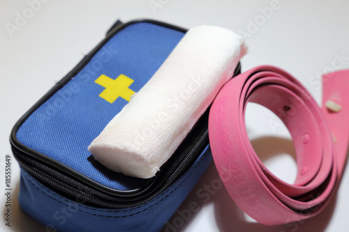 First aid kit for first aid in case of trauma, tourniquet for stopping bleeding, bandage for bandaging.