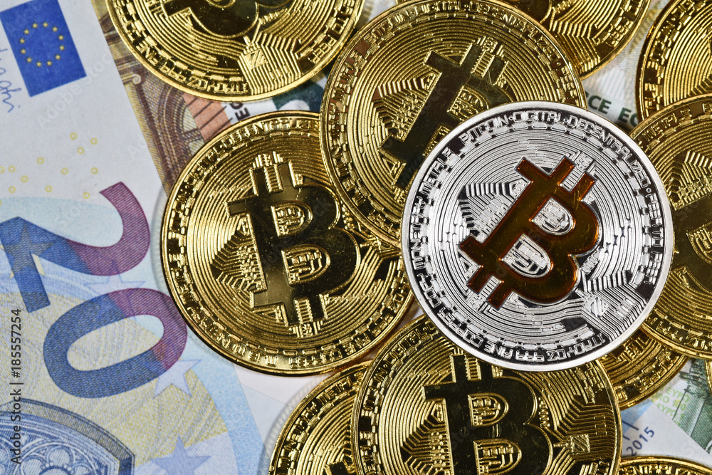 Bitcoin monnaie virtuelle argent piece salaire paiement echange change taux  bourse Stock Photo