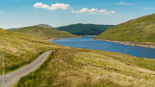 Welsh landscape and a country road at the Nant-y-Moch Reservoir, Ceredigion, Dyfed, Wales, UK