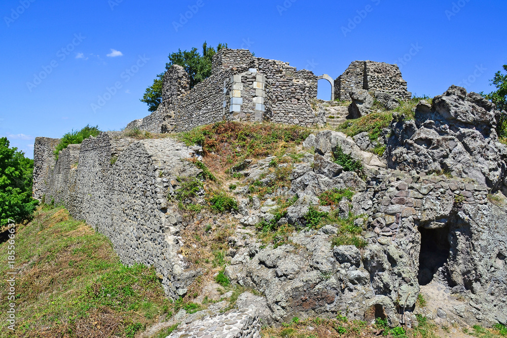 Old ruin with mountains in Hungary