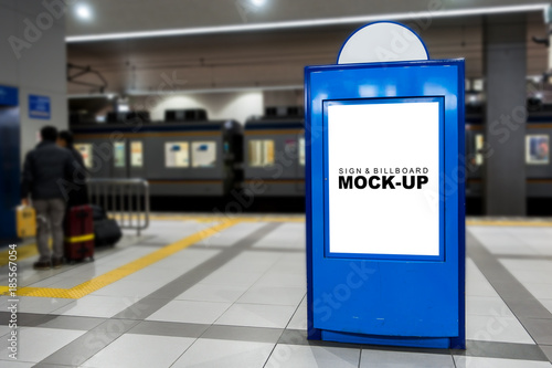 Mock up blank screen on blue billboard at the train station platform