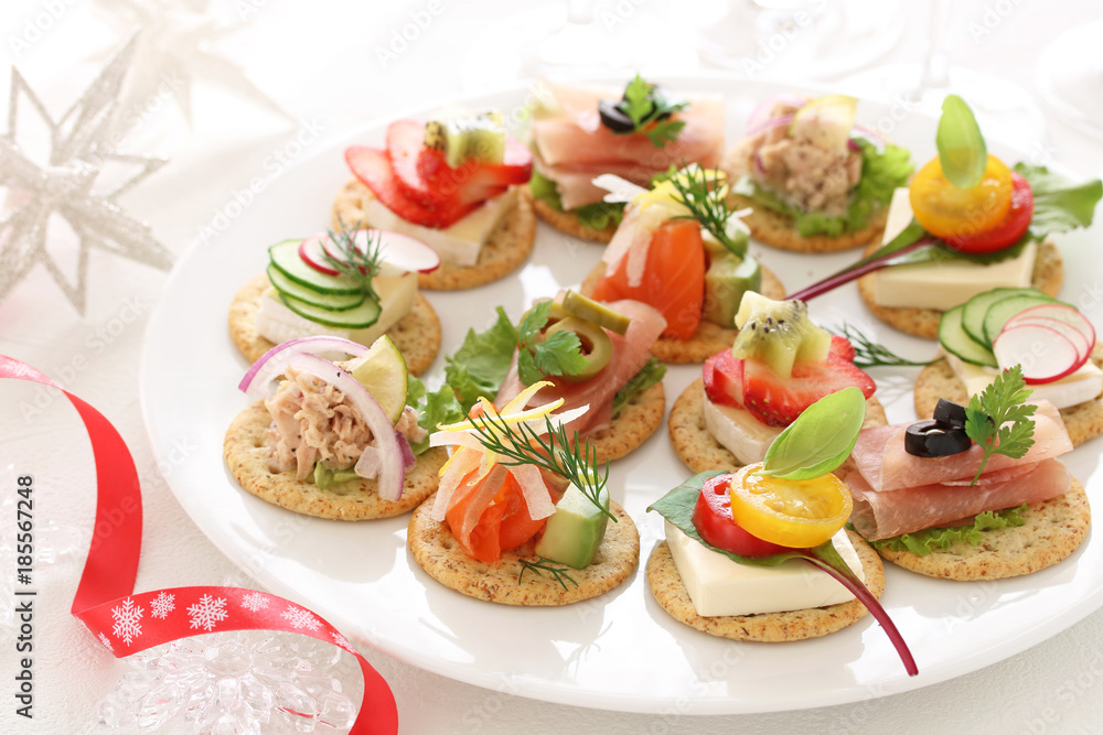 Delicous assorted cnapes for festive appetizer Delicous assorted cnapes for festive appetizer